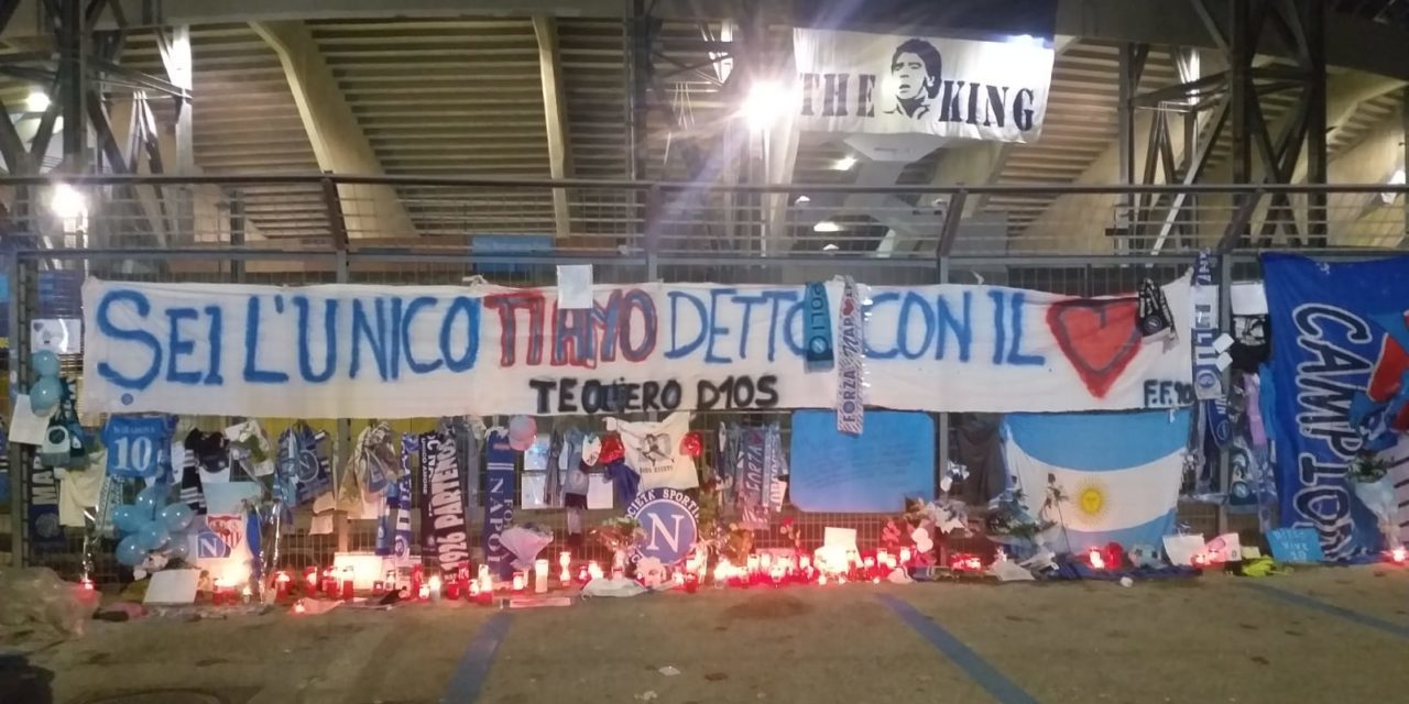Napoli fans pay tribute to Diego Armando Maradona outside the stadio San Paolo the day after his death