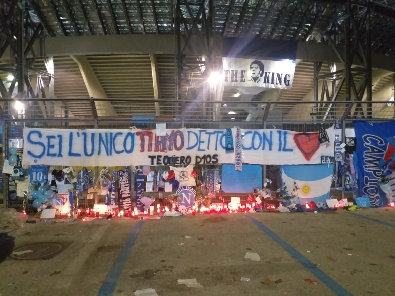 Napoli fans pay tribute to Diego Armando Maradona outside the stadio San Paolo the day after his death