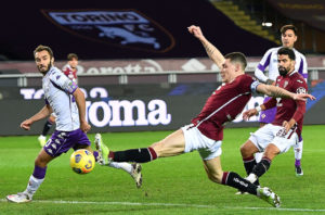 Andrea Belotti scores for Torino against Fiorentina