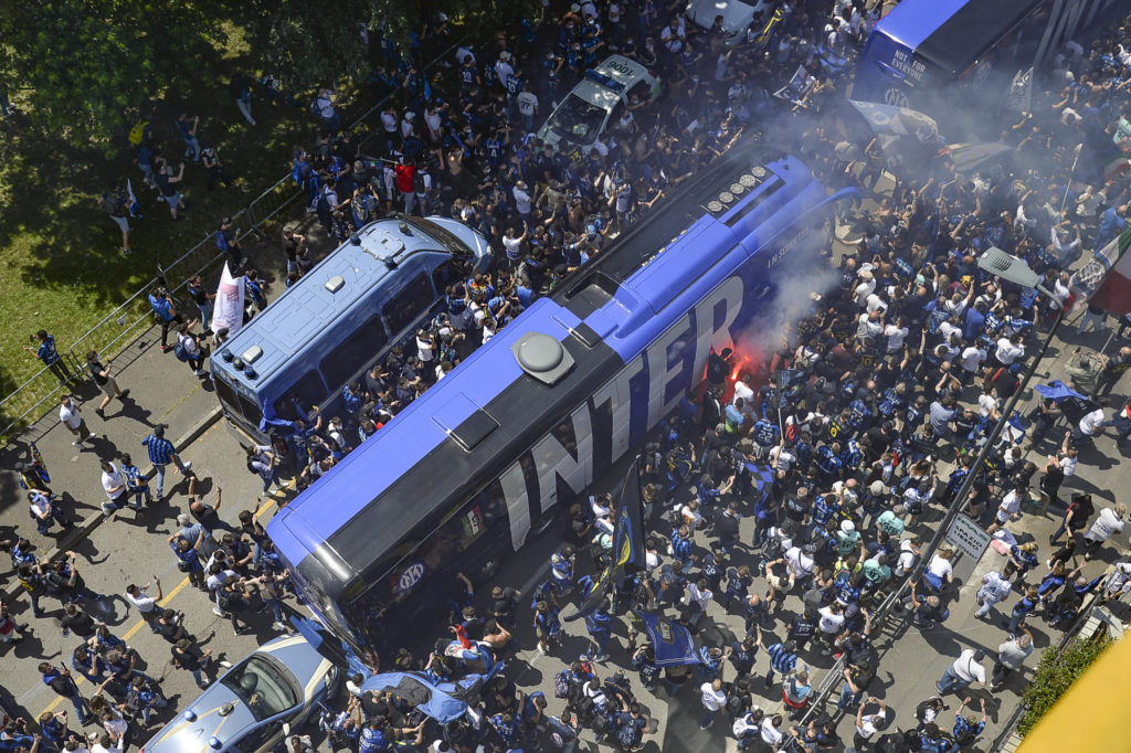 Inter supporters welcome the team bus prior to the final game of the season