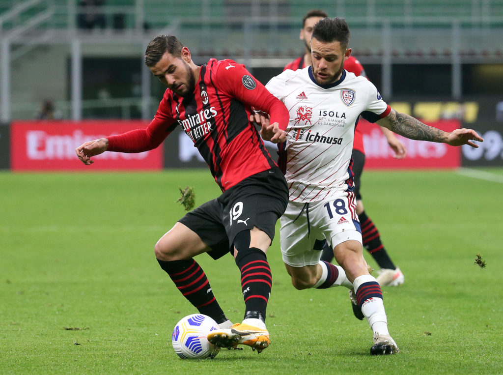 Cagliari's Nahitan Nandez holds off Milan's Theo Hernandez