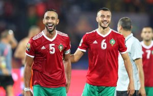 epa07680964 Moroccan players Mehdi Benatia (L) and Romain Saiss (R) celebrate after winning the 2019 Africa Cup of Nations (AFCON) group D soccer match between Morocco and the Ivory Coast at Salam Stadium in Cairo, Egypt, 28 June 2019.  EPA-EFE/GAVIN BARKER