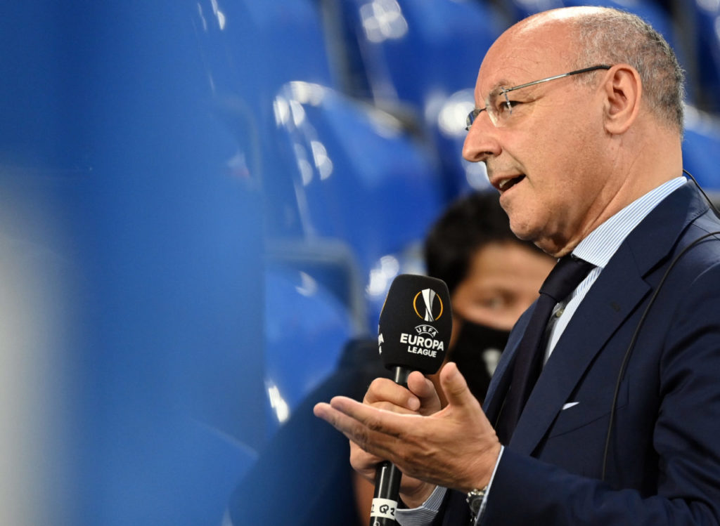 epa08586129 Inter Milan CEO for sport Giuseppe Marotta gives a TV interview before the UEFA Europa League Round of 16 match between Inter Milan and Getafe in Gelsenkirchen, Germany, 05 August 2020. EPA-EFE/Ina Fassbender / POOL