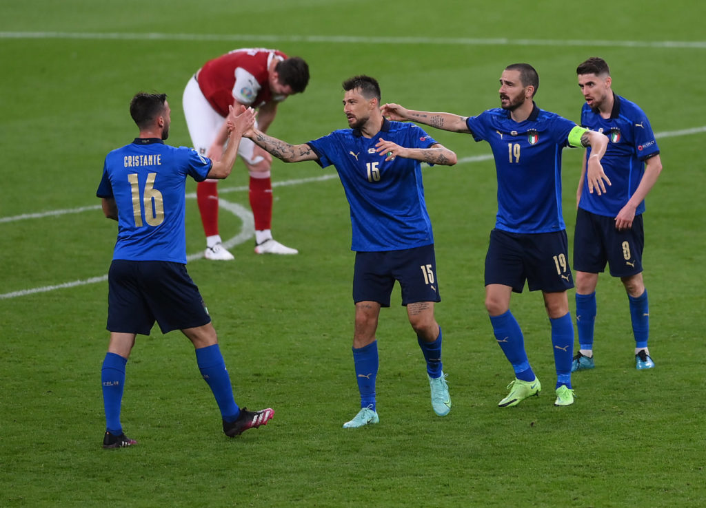 Cristante, Acerbi, Bonucci and Jorginho celebrate after the UEFA EURO 2020 round of 16 match between Italy and Austria in London.