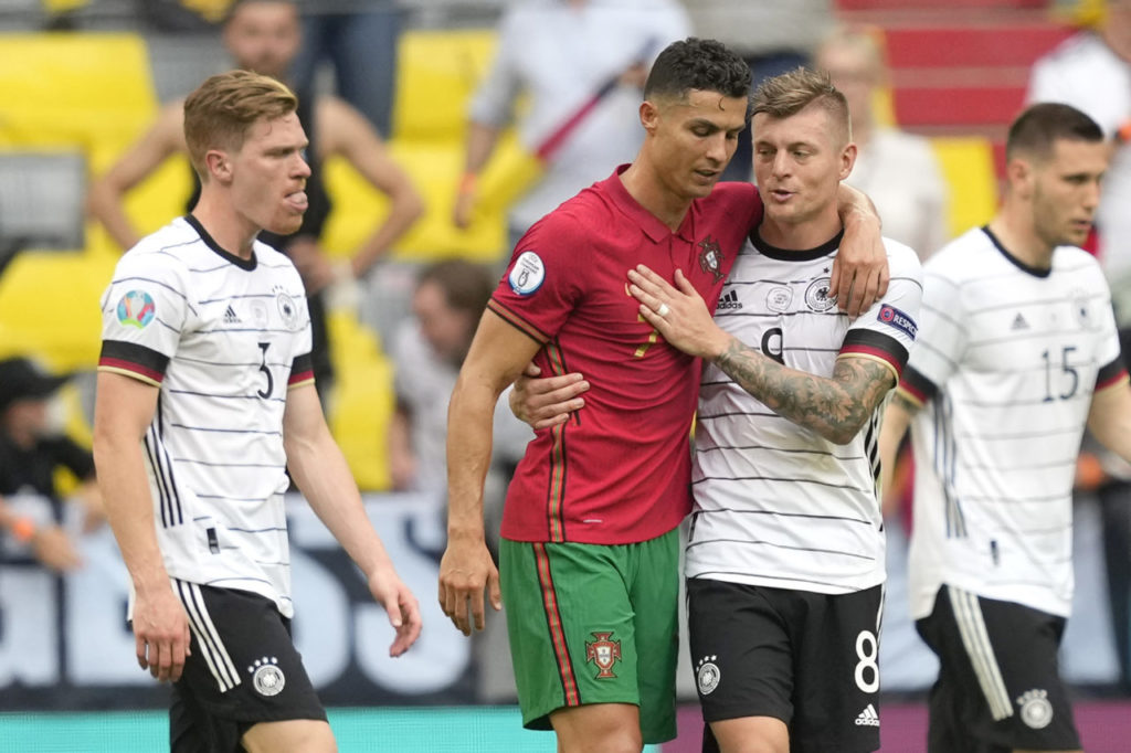 Toni Kroos and Cristiano Ronaldo talk after Portugal vs. Germany at Euro 2020