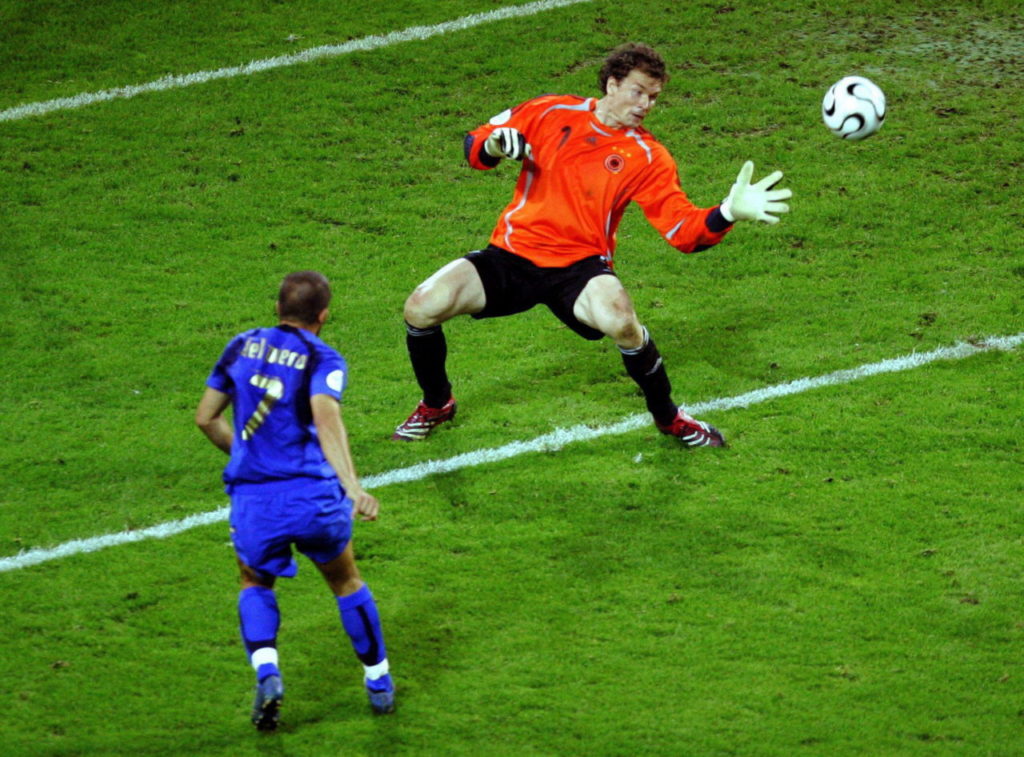 Alessandro del Piero goes for his 0-2 against Germany and goalie Jens Lehmann during extra time in the semi final of the 2006 FIFA World Cup between Germany and Italy in Dortmund, Germany.