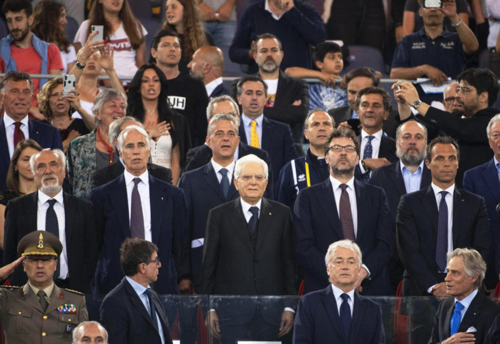 Italian president Sergio Mattarella (C) is flanked by Italian National Olympic Committee (CONI) president Giovanni Malago (C-L) and Giancarlo Giorgetti (C-R), Italian undersecretary of state to the presidency of the council of ministers, during the Golden Gala - Pietro Mennea athletics meeting as part of the IAAF Diamond League at the Olympic stadium in Rome, Italy