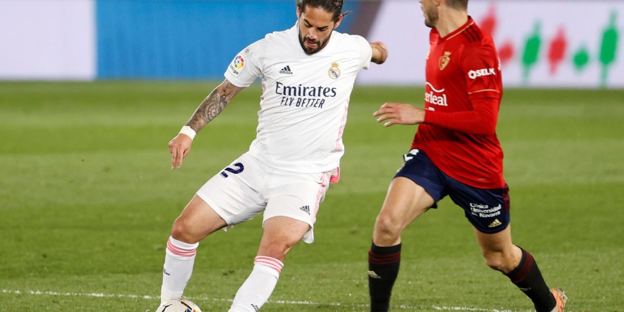 Real Madrid's Isco (L) in action during the Spanish La Liga soccer match between Real Madrid and CA Osasuna at Alfredo Di Stefano stadium in Madrid.