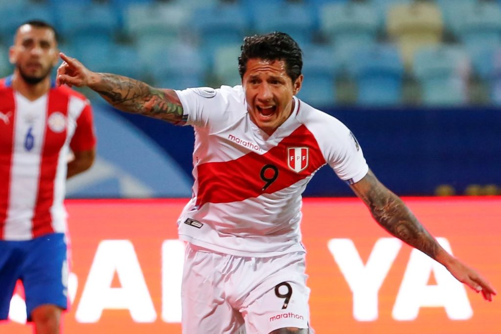 Gianluca Lapadula of Peru celebrates after scoring against Paraguay, during a match for the quarter-finals of the Copa America 2021