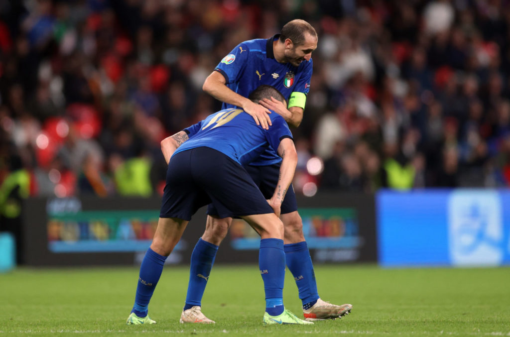 Giorgio Chiellini of Italy (R) reacts with Leonardo Bonucci of Italy during the UEFA EURO 2020 semi final between Italy and Spain in London.