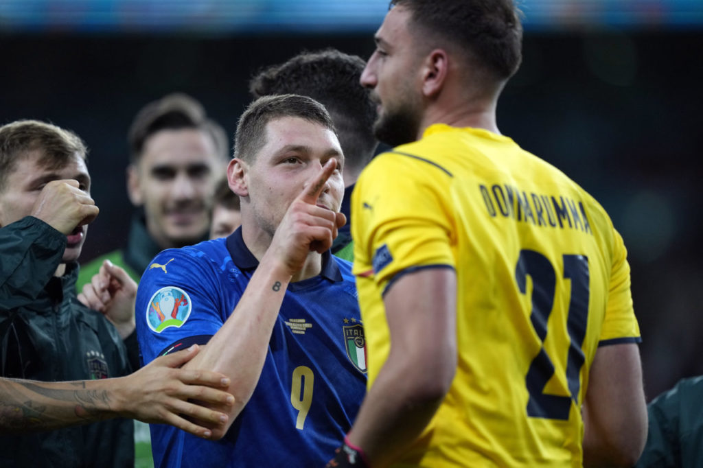 Andrea Belotti of Italy and Goalkeeper Gianluigi Donnarumma (R) of Italy react after the UEFA EURO 2020 semi final between Italy and Spain in London