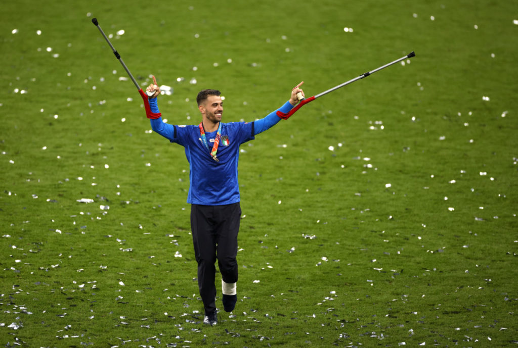 Italian player Leonardo Spinazzola who was injured earlier in the tournament celebrates after Italy won the UEFA EURO 2020 final between Italy and England in London