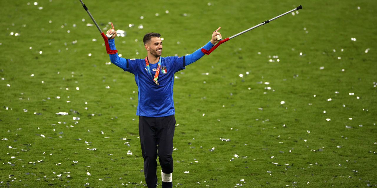 Italian player Leonardo Spinazzola who was injured earlier in the tournament celebrates after Italy won the UEFA EURO 2020 final between Italy and England in London