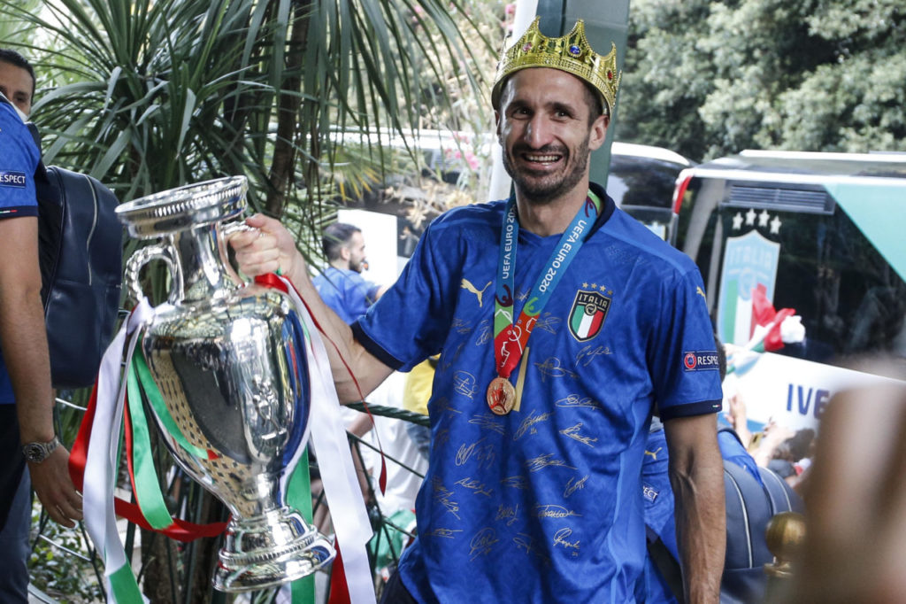 Captain of Italy Giorgio Chiellini carries the European Championship trophy after Italy won the UEFA EURO 2020 final soccer match between Italy and England as they arrive in Rome, Italy, 12 July 2021.