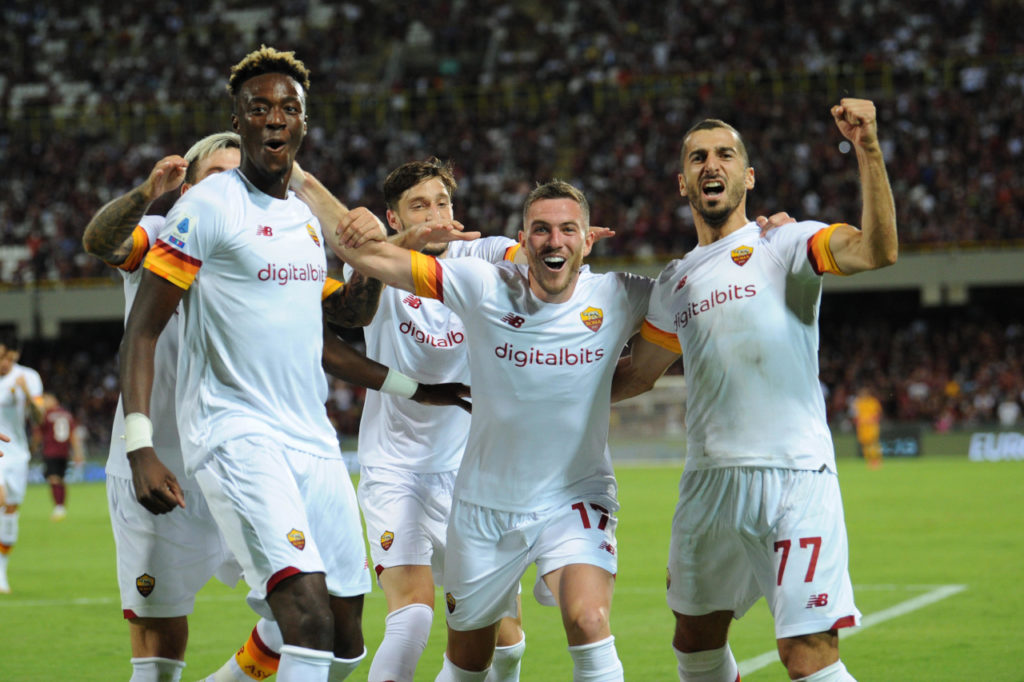 Roma's Jordan Veretout (C) celebrates with teammates Tammy Abraham (L) and Henrikh Mkhitaryan