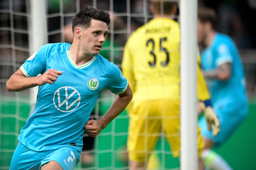 epa09406341 Wolfsburg's Josip Brekalo celebrates after scoring the 1-1 equalizer during the German DFB Cup first round soccer match between Preussen Muenster and VfL Wolfsburg in Muenster, Germany, 08 August 2021. EPA-EFE/SASCHA STEINBACH CONDITIONS - ATTENTION: The DFB regulations prohibit any use of photographs as image sequences and/or quasi-video.