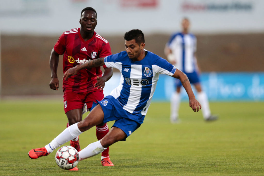 epa07721098 FC Porto's Jesus Manuel Corona (R) in action against Fulham's Aboubakar Kamara (L) during a friendly soccer match between FC Porto and Fulham at Estadio Municipal de Albufeira, in Albufeira, Portugal, 16 July 2019. EPA-EFE/FILIPE FARINHA