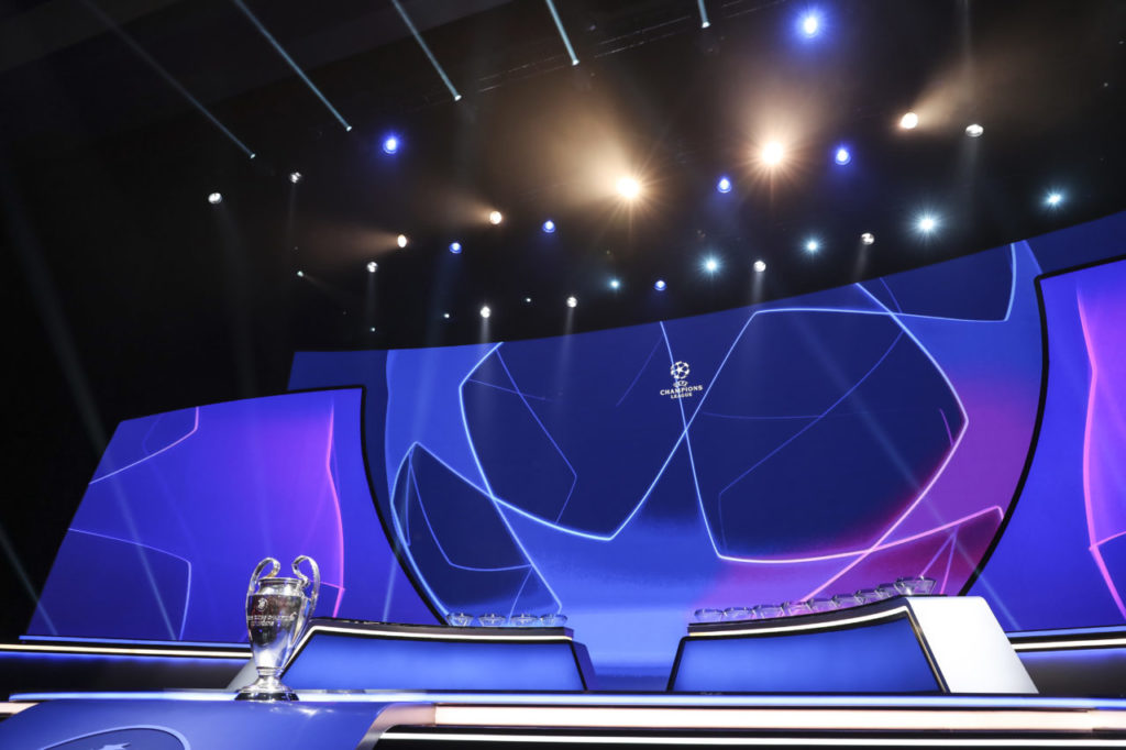 epa09430465 The Champions League trophy is on display during the UEFA Draw and Awards Ceremony at the Halic Congress Center in Istanbul, Turkey, 26 August 2021. EPA-EFE/TOLGA BOZOGLU