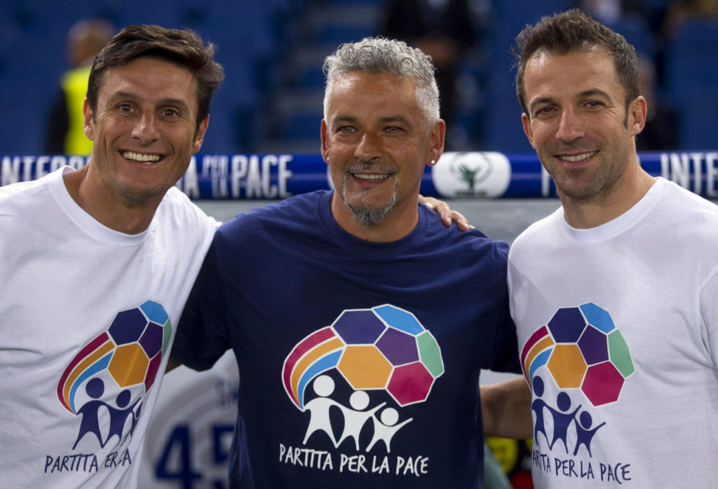 epa04379951 Former soccer players (L-R) Argentinian Javier Zanetti, Italians Roberto Baggio and Alessandro Del Piero pose for photographers before the Interreligious 'Match for Peace' at the Olimpico Stadium in Rome, Italy, 01 September 2014. The match has been organised by Pope Francis upon the pope's appeals for an end to conflicts around the world. EPA/CLAUDIO PERI