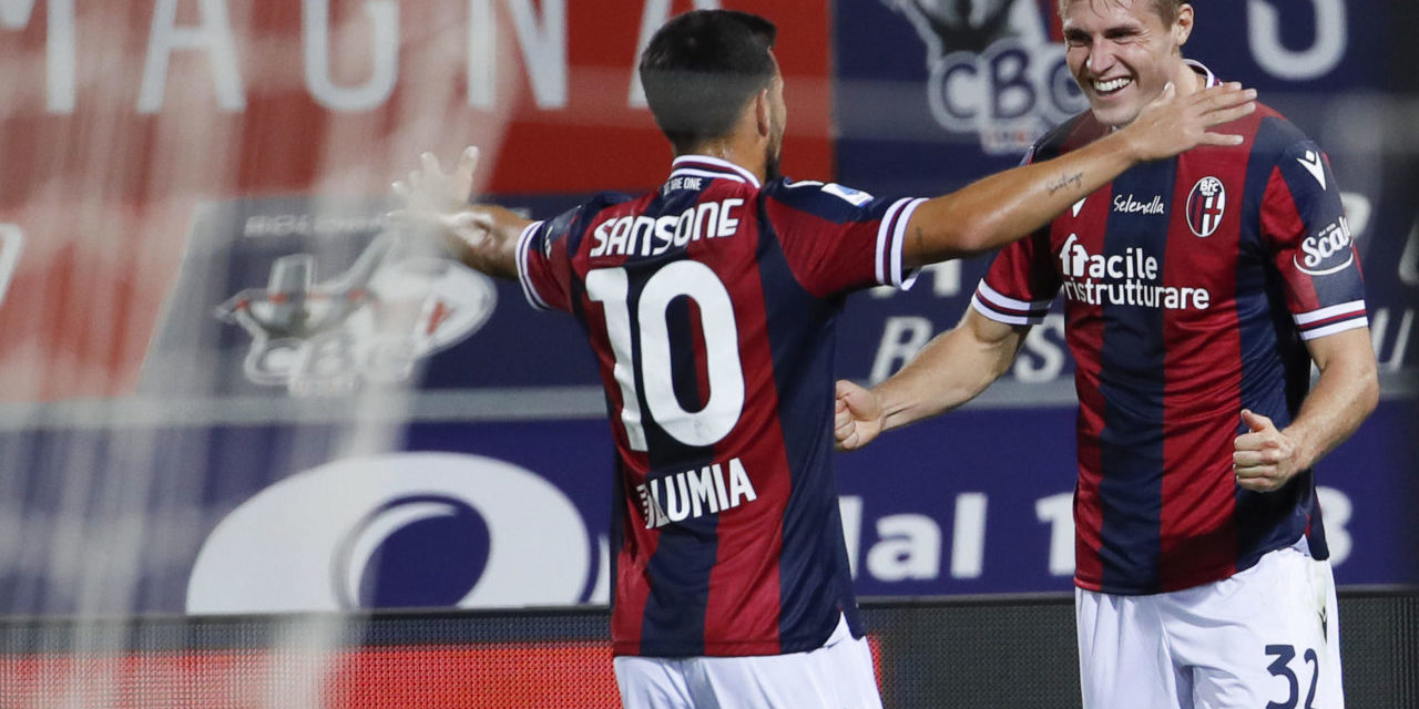 epa09466310 Bologna's Mattias Svanberg (R) celebrates after scoring his team's first goal during the Italian Serie A soccer match Bologna FC vs Hellas Verona FC at Renato Dall'Ara stadium in Bologna, Italy, 13 September 2021. EPA-EFE/ELISABETTA BARACCHI