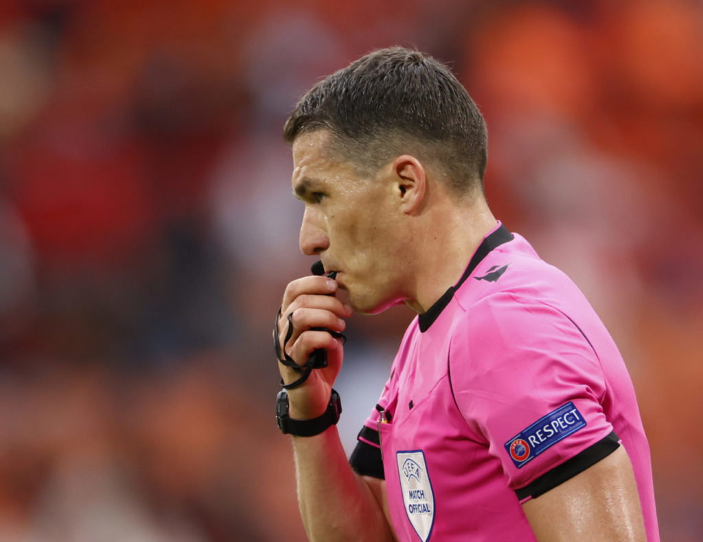 epa09291360 Romanian referee Istvan Kovacs reacts during the UEFA EURO 2020 preliminary round group C soccer match between North Macedonia and the Netherlands in Amsterdam, Netherlands, 21 June 2021. EPA-EFE/Koen van Weel / POOL (RESTRICTIONS: For editorial news reporting purposes only. Images must appear as still images and must not emulate match action video footage. Photographs published in online publications shall have an interval of at least 20 seconds between the posting.)