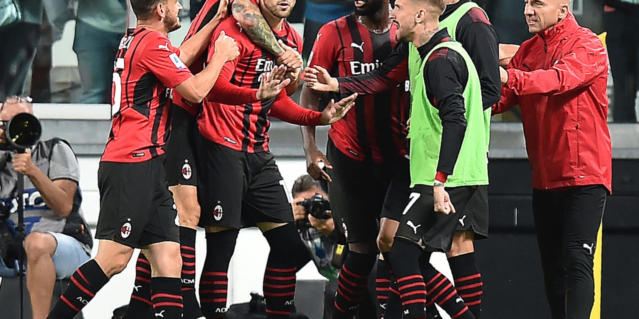epa09477269 Milan's Ante Rebic (C) celebrates with teammates after scoring the 1-1 equalizer during the Italian Serie A soccer match between Juventus FC and AC Milan in Turin, Italy, 19 September 2021. EPA-EFE/ALESSANDRO DI MARCO