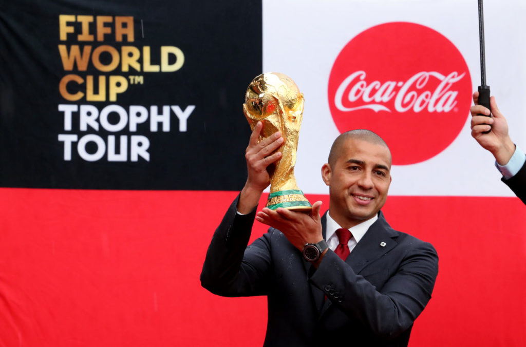epa06643946 Franco-Argentine former soccer player David Trezeguet presents the FIFA World Cup trophy as it arrives to Bogota, Colombia, 03 April 2018. The trophy of the World Cup arrived in Colombia as part of a tour going to 50 countries before the World Cup. EPA-EFE/Leonardo Munoz