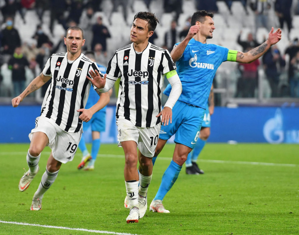 epa09560408 Juventus? Paulo Dybala (C) celebrates after scoring the 2-1 goal during the UEFA Champions League group H soccer match Juventus FC vs Zenit St. Petersburg at the Allianz Stadium in Turin, Italy, 02 November 2021. EPA-EFE/ALESSANDRO DI MARCO
