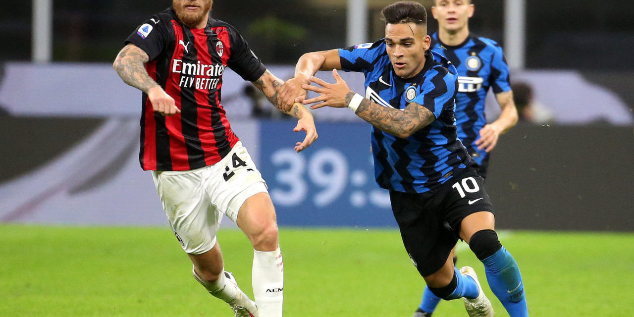 epa08753841 Milan's Simon Kjaer (L) in action against Inter's Lautaro Martinez (R) during the Italian Serie A soccer match between Inter Milan and AC Milan at Giuseppe Meazza stadium in Milan, Italy, 17 October 2020. EPA-EFE/MATTEO BAZZI