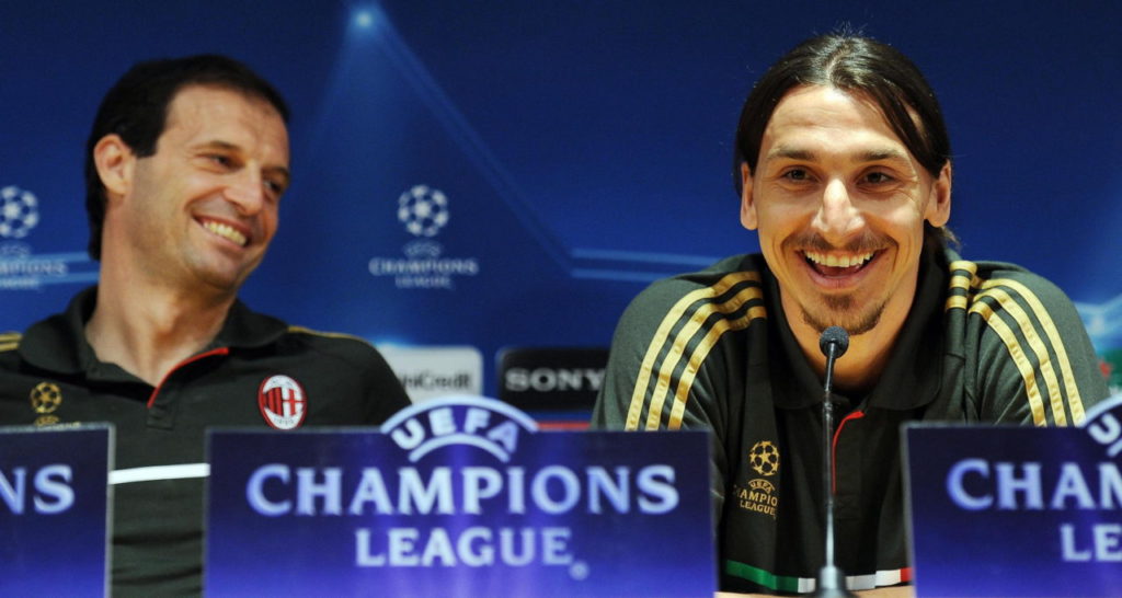 epa03161262 The head coach of Milan Massimiliano Allegri (L) and Swedish forward Zlatan Ibrahimovic of AC Milan during a press conference at the sports center of Milanello to Cargago (Varese), Italy, 27 March 2012. AC Milan plays FC Barcelona in the Champions League quarter final on 28 March 2012. EPA/STR