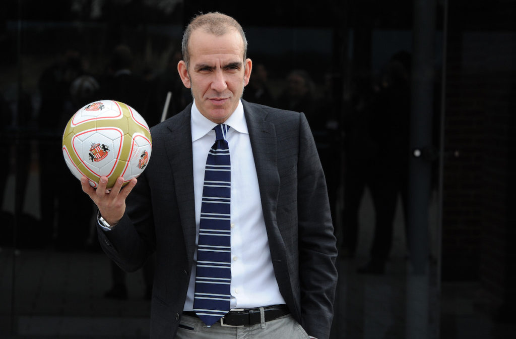 epa03647485 New Sunderland manager Paolo Di Canio holds up a ball during his unveiling at the Academy of light training facility in Sunderland, Britain 02 April 2013. Di Canio defended himself 01 April 2013 in the face of accusations that he is a fascist. The Italian, who was named as the club's new manager late on 31 March 2013, has reportedly expressed fascist sympathies in the past. EPA/PETER POWELL .