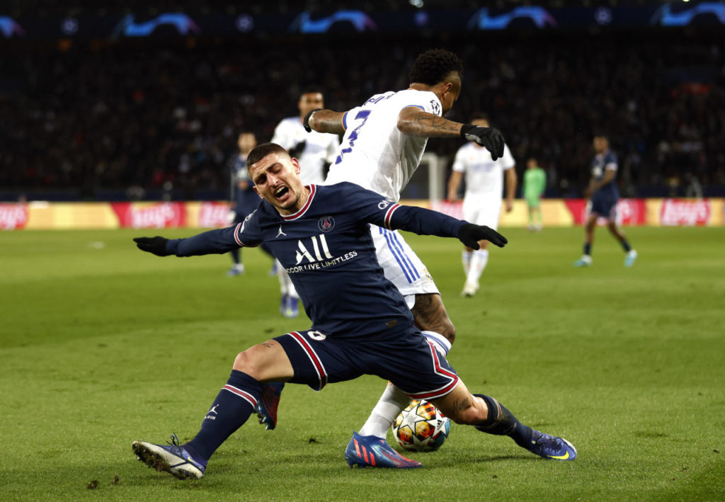 epa09760196 Marco Verratti (L) of PSG in action against Eder Militao (R) of Real Madrid during the UEFA Champions League round of 16, first leg soccer match between Paris Saint-Germain (PSG) and Real Madrid in Paris, France, 15 February 2022. EPA-EFE/Yoan Valat