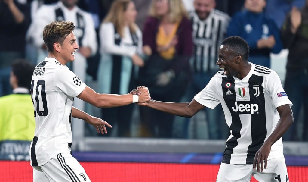 epa07064670 Juventus Paulo Dybala (L) celebrates with teammate Blaise Matuidi after scoring a goal during the UEFA Champions League group stage match between Juventus FC and BSC Young Boys Bern at the Allianz Arena in Turin, Italy, 02 October 2018. EPA-EFE/ALESSANDRO DI MARCO