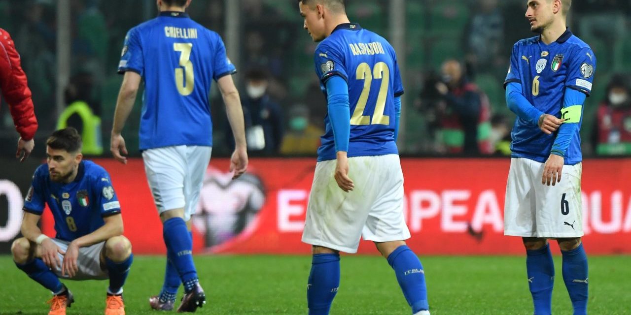 epa09847764 Italy players show their dejection at the end of the FIFA World Cup Qatar 2022 play-off qualifying soccer match between Italy and North Macedonia at the Renzo Barbera stadium in Palermo, Sicily, Italy, 24 March 2022. EPA-EFE/CARMELO IMBESI