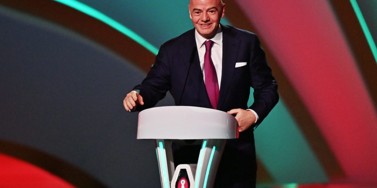 epa09864023 FIFA president Gianni Infantino speaks at the start of the main draw for the FIFA World Cup 2022 in Doha, Qatar, 01 April 2022. EPA-EFE/NOUSHAD THEKKAYIL