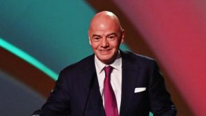 epa09864023 FIFA president Gianni Infantino speaks at the start of the main draw for the FIFA World Cup 2022 in Doha, Qatar, 01 April 2022. EPA-EFE/NOUSHAD THEKKAYIL