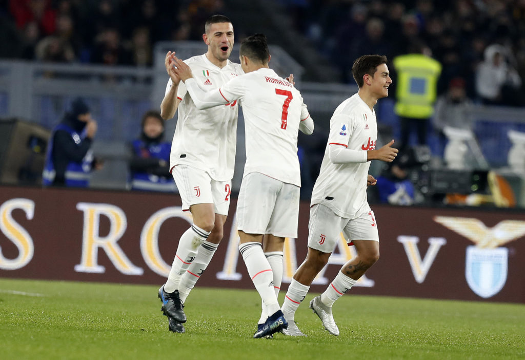 epa08123532 Juventus' Merih Demiral (L) celebrates his goal with Cristiano Ronaldo (R) during Serie A soccer match Roma - Juventus at Olimpico Stadium in Rome, ITaly, 12 January 2020. EPA-EFE/RICRDO ANTIMIANI