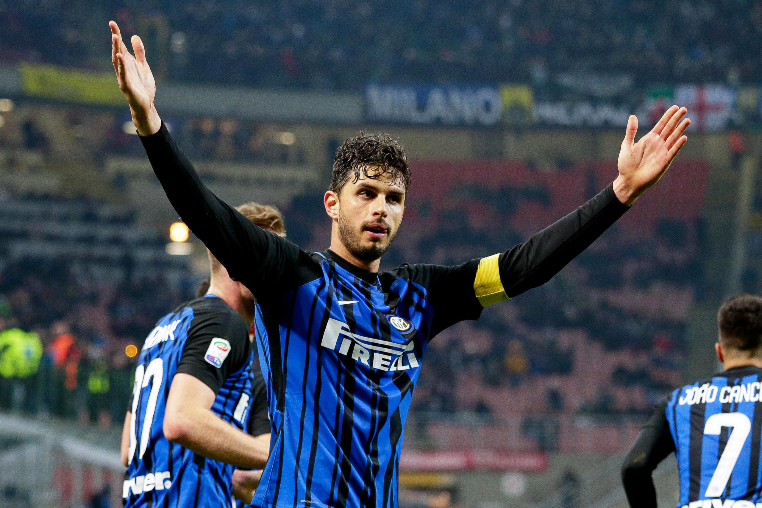 Inter's defender Andrea Ranocchia (C) celebrates after scoring the 2-0 lead during the Italian Serie A soccer match between Inter Milan and Benevento Calcio at Giuseppe Meazza Stadium in Milan, Italy, 24 February 2018.  EPA-EFE/ROBERTO BREGANI