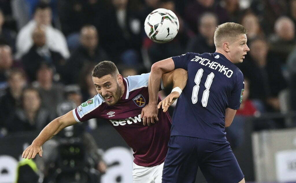 epa09549575 West Ham's Nikola Vlasic (L) in action against Manchester City's Oleksandr Zinchenko (R) during the Carabao Cup round of 16 soccer match between West Ham United and Manchester City in London, Britain, 27 October 2021. EPA-EFE/Facundo Arrizabalaga EDITORIAL USE ONLY. No use with unauthorized audio, video, data, fixture lists, club/league logos or 'live' services. Online in-match use limited to 120 images, no video emulation. No use in betting, games or single club/league/player publications