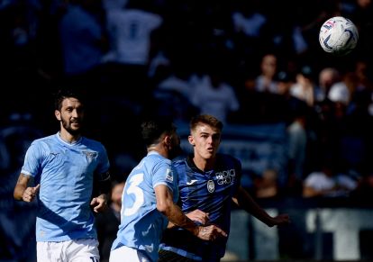 Lazio Spanish midfielder #10 Luis Alberto (L) and Albanian dfender #23 Elseid Hysaj fights for the ball against Atalanta Belgian midfielder #17 Charles De Ketelaere (R) during the Italian Serie A football match between Lazio and Atalanta at the Olympic stadium in Rome on October 8, 2023. (Photo by Filippo MONTEFORTE / AFP) (Photo by FILIPPO MONTEFORTE/AFP via Getty Images)