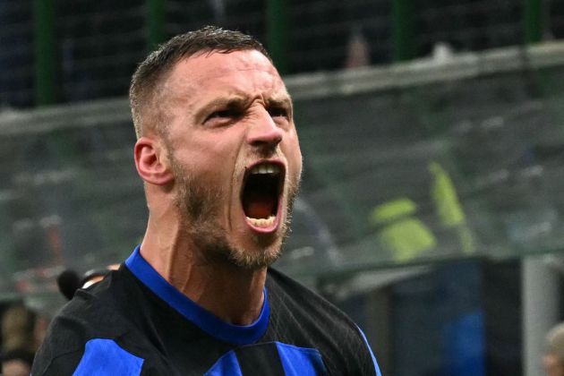 Inter Milan's Austrian forward #08 Marko Arnautovic celebrates after scoring the team's first goal during the UEFA Champions League last 16 first leg football match Inter Milan vs Atletico Madrid at the San Siro stadium in Milan on February 20, 2024. (Photo by GABRIEL BOUYS / AFP) (Photo by GABRIEL BOUYS/AFP via Getty Images)