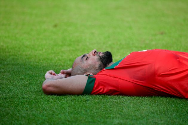 TOPSHOT - Morocco's midfielder #4 Sofyan Amrabat reacts at the end of the Africa Cup of Nations (CAN) 2024 group F football match between Morocco and DR Congo at Stade Laurent Pokou in San Pedro on January 21, 2024. (Photo by SIA KAMBOU / AFP) (Photo by SIA KAMBOU/AFP via Getty Images)