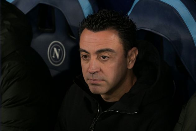 Barcelona's Spanish coach Xavi looks on from the bench during the UEFA Champions League round of 16 first Leg football match between Napoli and Barcelona at the Diego-Armando-Maradona stadium in Naples on February 21, 2024. (Photo by Tiziana FABI / AFP) (Photo by TIZIANA FABI/AFP via Getty Images)