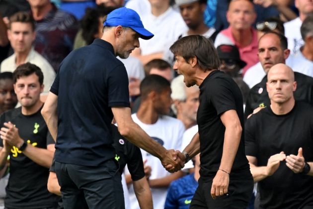Tottenham Hotspur head coach Antonio Conte (R) and Chelsea head coach Thomas Tuchel (L) shake hands then clash after the English Premier League football match between Chelsea and Tottenham Hotspur at Stamford Bridge in London on August 14, 2022. - The game finished 2-2. - RESTRICTED TO EDITORIAL USE. No use with unauthorized audio, video, data, fixture lists, club/league logos or 'live' services. Online in-match use limited to 120 images. An additional 40 images may be used in extra time. No video emulation. Social media in-match use limited to 120 images. An additional 40 images may be used in extra time. No use in betting publications, games or single club/league/player publications. (Photo by Glyn KIRK / AFP) / RESTRICTED TO EDITORIAL USE. No use with unauthorized audio, video, data, fixture lists, club/league logos or 'live' services. Online in-match use limited to 120 images. An additional 40 images may be used in extra time. No video emulation. Social media in-match use limited to 120 images. An additional 40 images may be used in extra time. No use in betting publications, games or single club/league/player publications. / RESTRICTED TO EDITORIAL USE. No use with unauthorized audio, video, data, fixture lists, club/league logos or 'live' services. Online in-match use limited to 120 images. An additional 40 images may be used in extra time. No video emulation. Social media in-match use limited to 120 images. An additional 40 images may be used in extra time. No use in betting publications, games or single club/league/player publications. (Photo by GLYN KIRK/AFP via Getty Images)