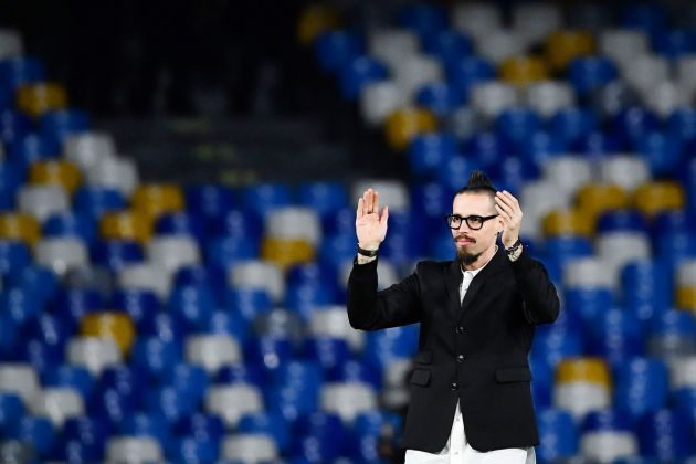 Former Napoli midfielder Marek Hamsik acknowledges the public at half-time of the UEFA Champions League Group E football match Napoli vs Genk on December 10, 2019 at the San Paolo stadium in Naples. (Photo by Tiziana FABI / AFP) (Photo by TIZIANA FABI/AFP via Getty Images)