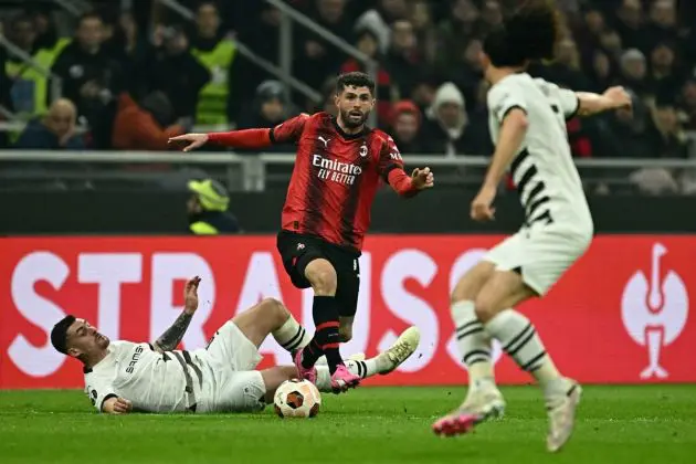 AC Milan forward #11 Christian Pulisic (C) fights for the ball with Rennes' French midfielder #08 Baptiste Santamaria during the UEFA Europa League Last 16 first leg between AC Milan and Rennes at the San Siro Stadium in Milan. (Photo by GABRIEL BOUYS / AFP) (Photo by GABRIEL BOUYS/AFP via Getty Images)