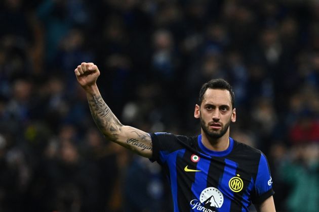 Inter Milan midfielder Hakan Calhanoglu celebrates his team's 1-0 victory after winning the Serie A football match between Inter Milan and Juventus at the San Siro stadium in Milan, on February 4, 2024. (Photo by Isabella BONOTTO / AFP) (Photo by ISABELLA BONOTTO/AFP via Getty Images)