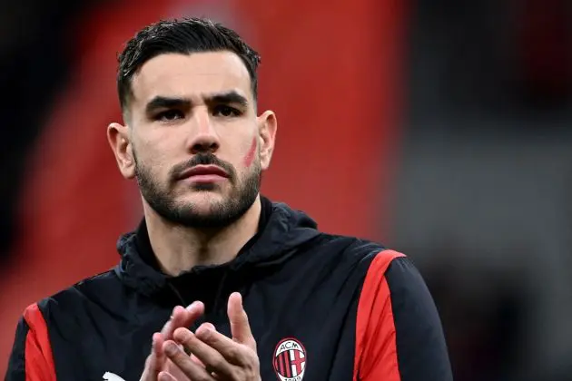 AC Milan defender Theo Hernandez applauds with a red sign on his face in support of the International Day for the Elimination of Violence Against women prior to the Serie A football match between AC Milan vs Fiorentina at San Siro stadium in Milan, on November 25, 2023. (Photo by Isabella BONOTTO / AFP) (Photo by ISABELLA BONOTTO/AFP via Getty Images)