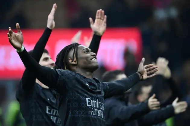 AC Milan forward Rafael Leao celebrates his team's victory with teammates at the end of the Italian Serie A football match between AC Milan and Napoli at the San Siro Stadium, in Milan on February 11, 2024. (Photo by Isabella BONOTTO / AFP) (Photo by ISABELLA BONOTTO/AFP via Getty Images)