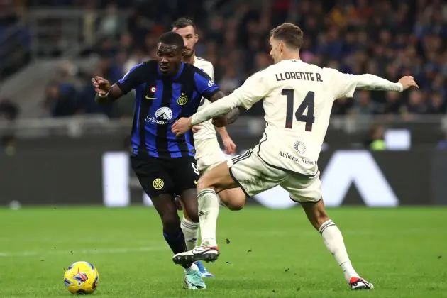 Marcus Thuram of FC Internazionale is challenged by Diego Llorente of AS Roma during the Serie A TIM match between FC Internazionale and AS Roma at Stadio Giuseppe Meazza on October 29, 2023 in Milan, Italy. (Photo by Marco Luzzani/Getty Images)